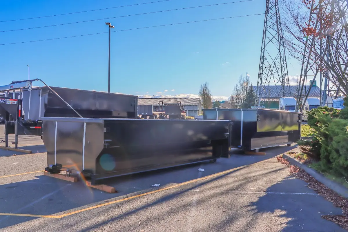 Roll-off dumpster ready for waste disposal at job site for 2 Yard Dumpster Rental in Essex Junction
